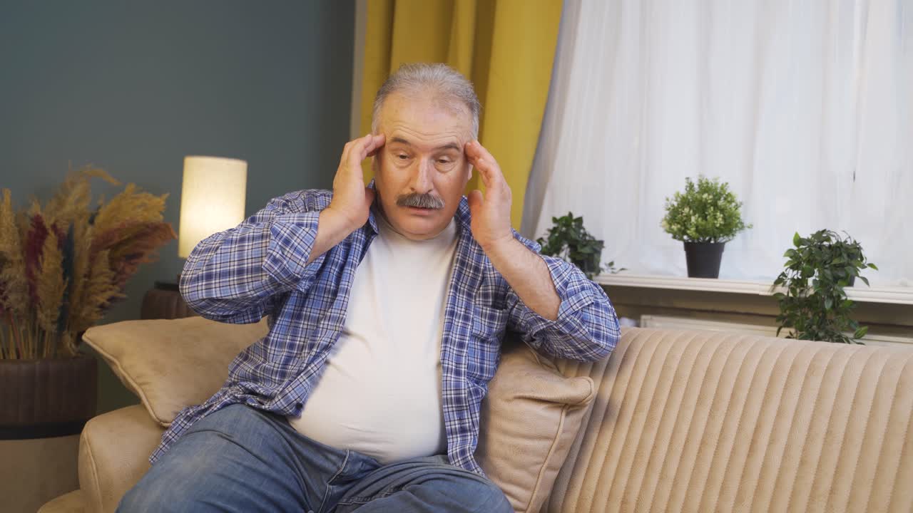 hombre con dolor de cabeza.