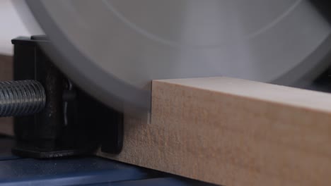 close-up carpenter hands use electric fiber cutting wood. building construction and industry concepts