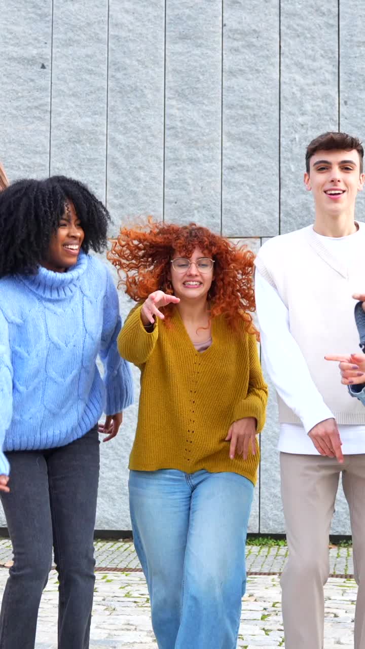 A group of young people dancing and having fun