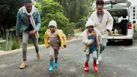 Running,-happy-and-black-family-in-a-home-driveway