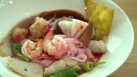 pink seafood flat noodles