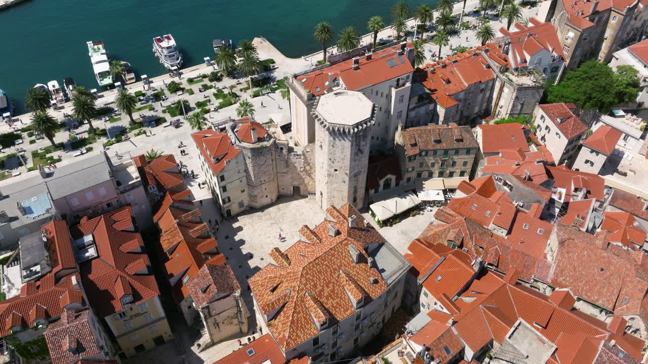 Waterfront Venetian Tower And Split Riva In Old Town Of Split In Croatia. - aerial shot