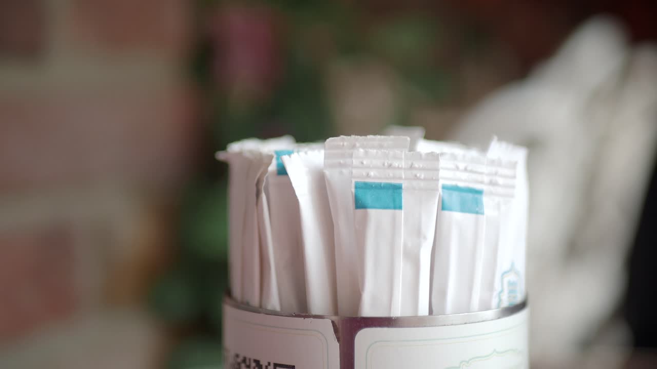 Sugar Packets in a Holder