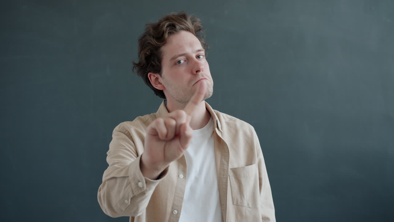 Man rejecting something