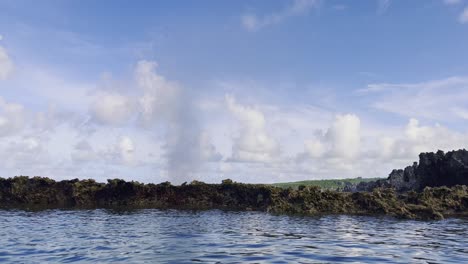 Low-angle-shot-of-blow-hole-in-Tinian,-Northern-Mariana-Islands