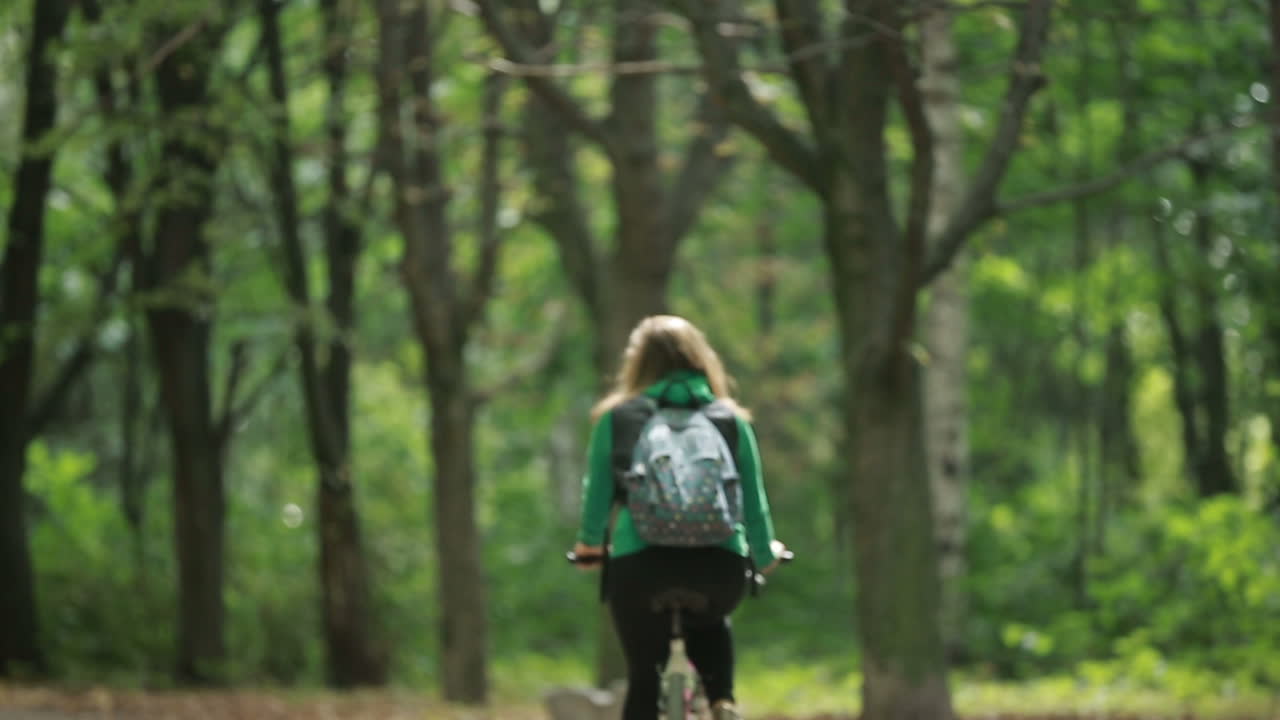Couple Together Ride A Bicycle. Romantic couple with bicycles at park