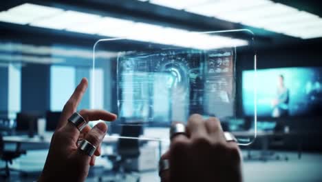 hands interacting with futuristic holographic display