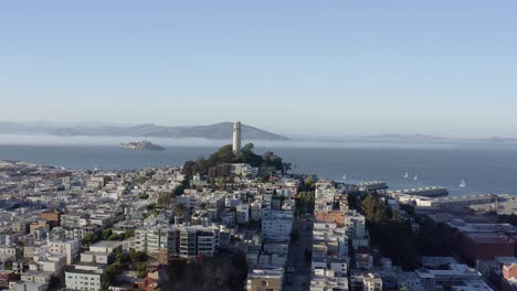 aerial, san francisco coit tower and cityscape, ascending drone