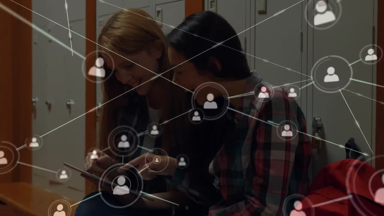 Animation of network of connections with icons over diverse female students talking in school