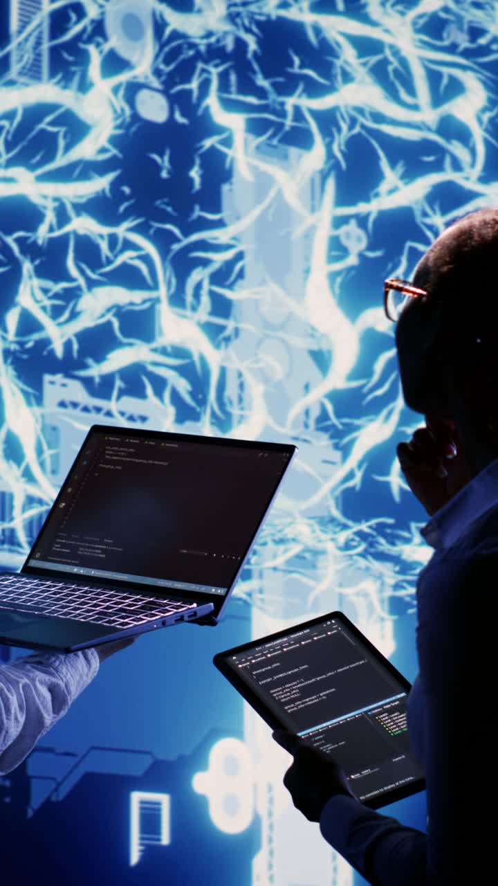 Vertical video Coworkers oversee AI neural network