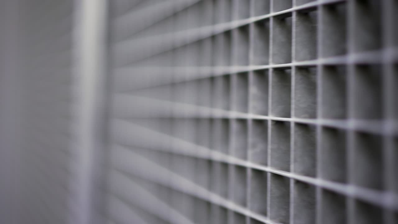 Security gate metal surface, metallic squares and lines