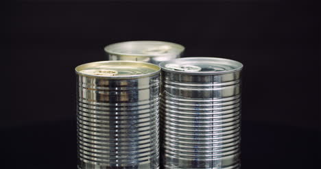 food supplies canned food rotating on black background 1