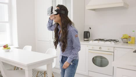 Young-woman-experiencing-virtual-reality-