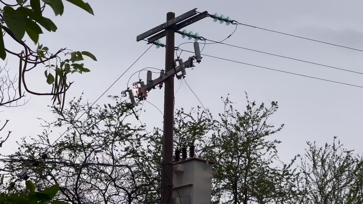Electric Wires Cables and Pole, Power Lines and Electrical Equipment Connector Conductor in Fire Burning, Electricity Short Circuit Danger and Risk due to Technical Problem after Storm