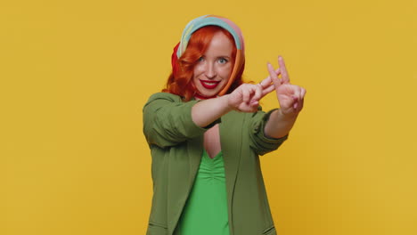 cheerful redhead woman showing hashtag symbol with hands, likes tagged message popular viral content