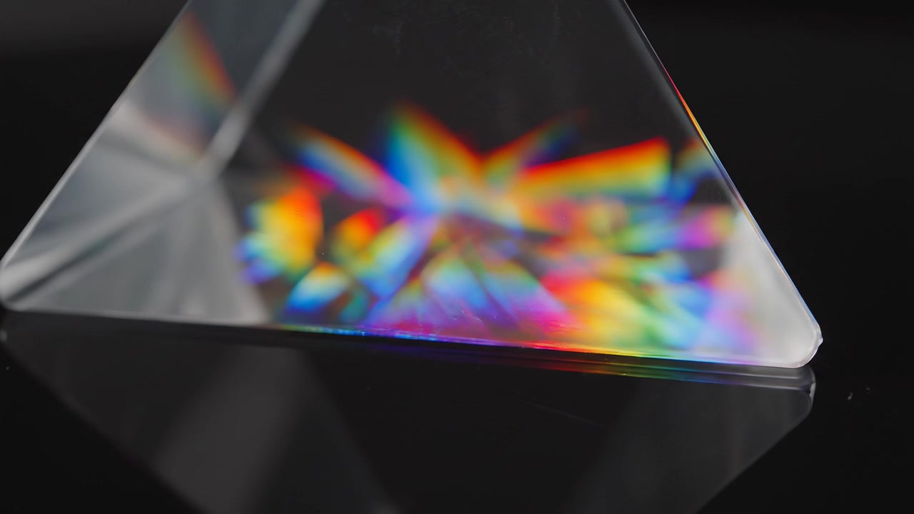 Macro View of Glass Prism Reflecting a Vibrant Rainbow Spectrum