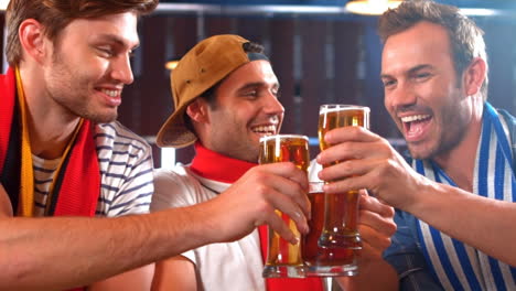 happy friends having a drink together