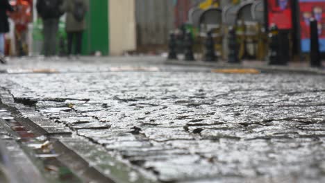 wet cobblestone street scene