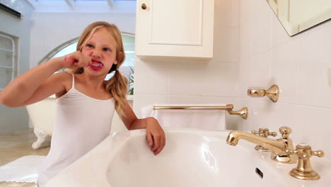 Cute-little-girl-brushing-her-teeth