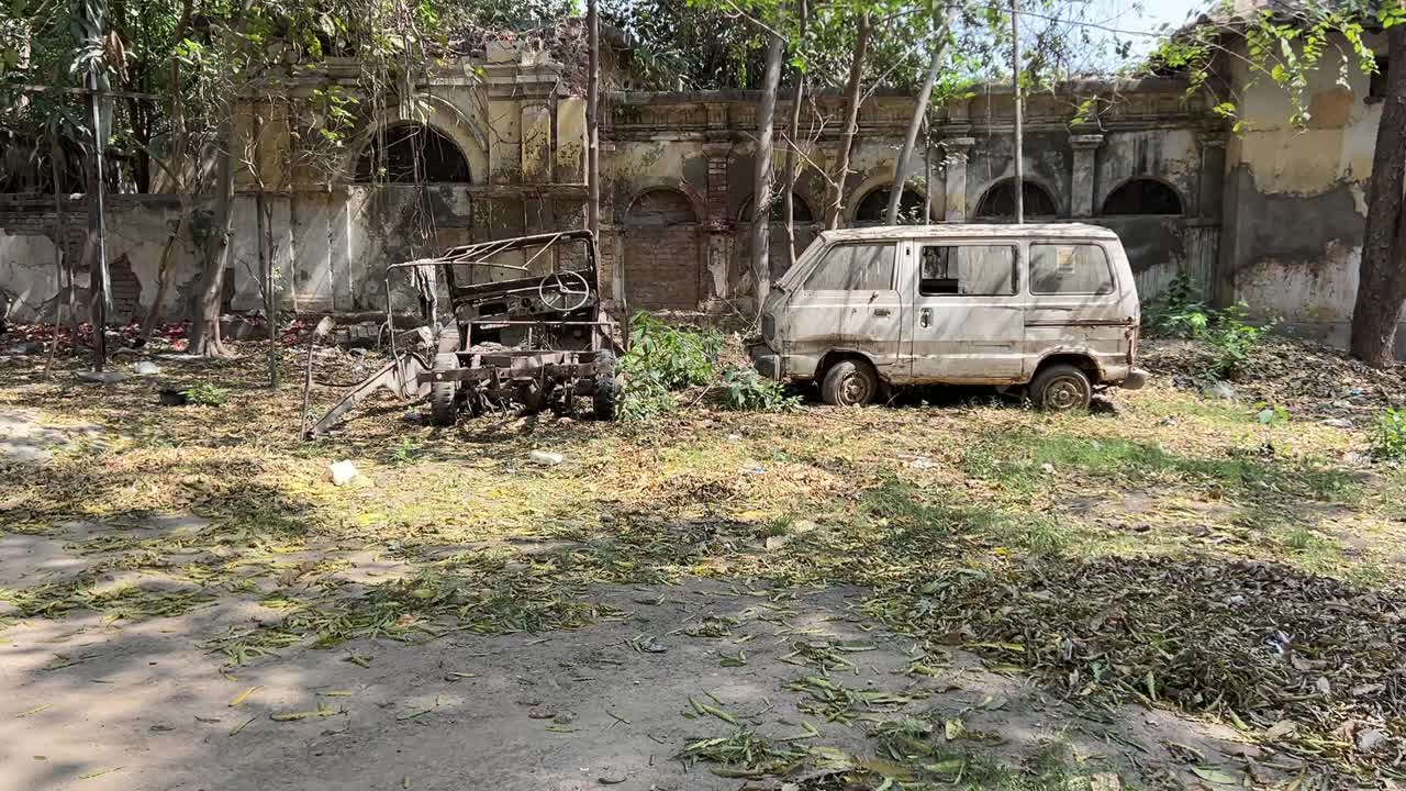 Abandoned jeep and omni van at wrecking yard. Unusable cars. Kidnapping cars.