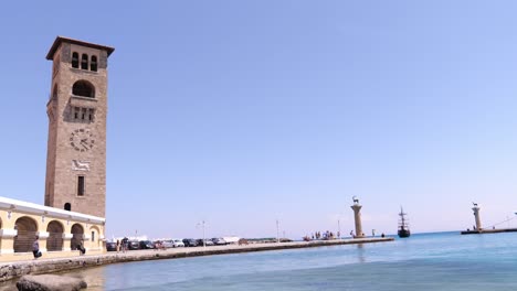 Clock-Tower-At-Rhodes-Harbour-With-Clear-Blue-Skies