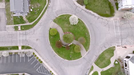 homer, michigan downtown roundabout with drone video moving up