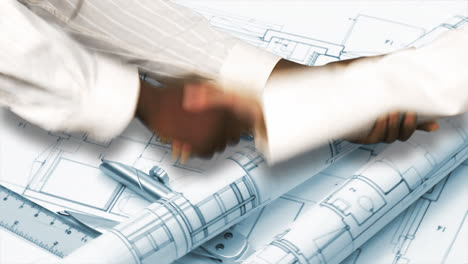 dos arquitectos estrechando la mano. acuerdo en arquitectura
