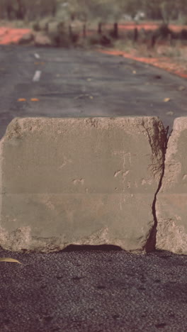 concrete blocks blocking a road