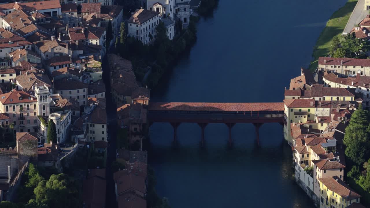 Aerial view of Ponte Vecchio, Bassano del Grappa, serene river scenery