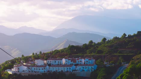 Apartment-complex-over-the-hill-near-Alhaurin-El-Grande,-Andalusia,-Spain