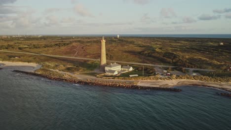 Scenic-Aerial-View-Of-Skagen-Grey-Lighthouse-Near-Jutland,-Skagen,-Denmark