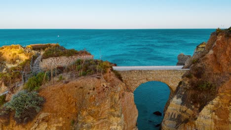 enchanting aerial view of coastal cliffs in portugal at sunset