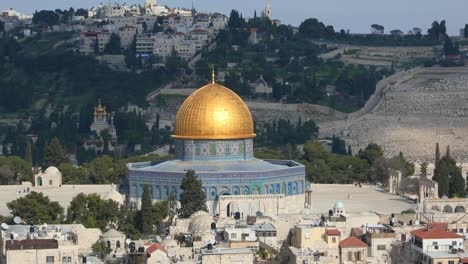 flock of doves flying near the mosque dome of the rock