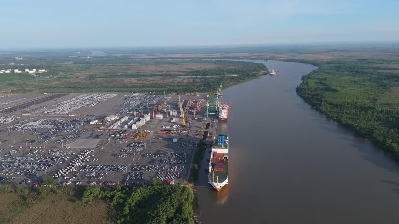 Aerial view of Parana River branch with international cargo port. Zarate, Buenos Aires, Argentina.