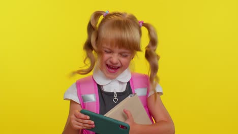 Funny-exited-school-girl-wear-backpack-enthusiastically-playing-racing-video-games-on-mobile-phone