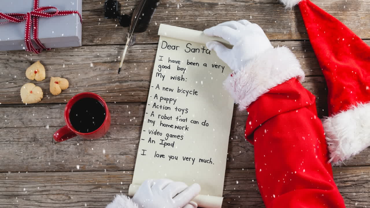 animação de neve caindo sobre carta a papai noel na mesa