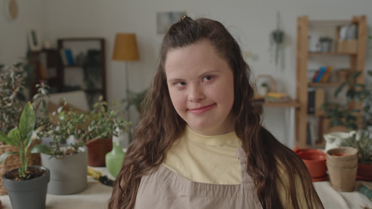 Woman with Down Syndrome Among Plants