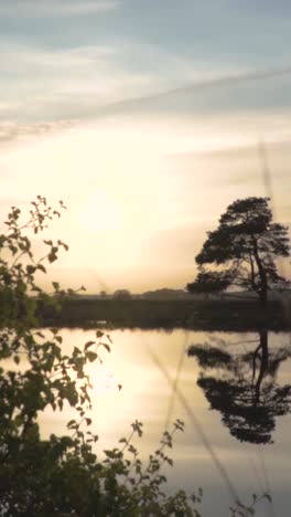 sunset reflections on a calm lake