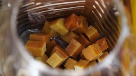 Nepalese-Chhurpi-in-a-box-in-a-little-local-snack-shop-in-Kathmandu,-Nepal