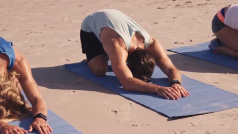 friends doing yoga together