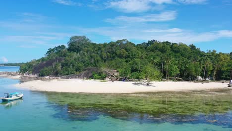 aerial of white sand tropical island beach on summer day in belitung indonesia