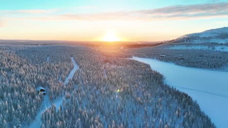 dramatic sunrise scene over pyhä-luosto national park in finnish lapland, finland