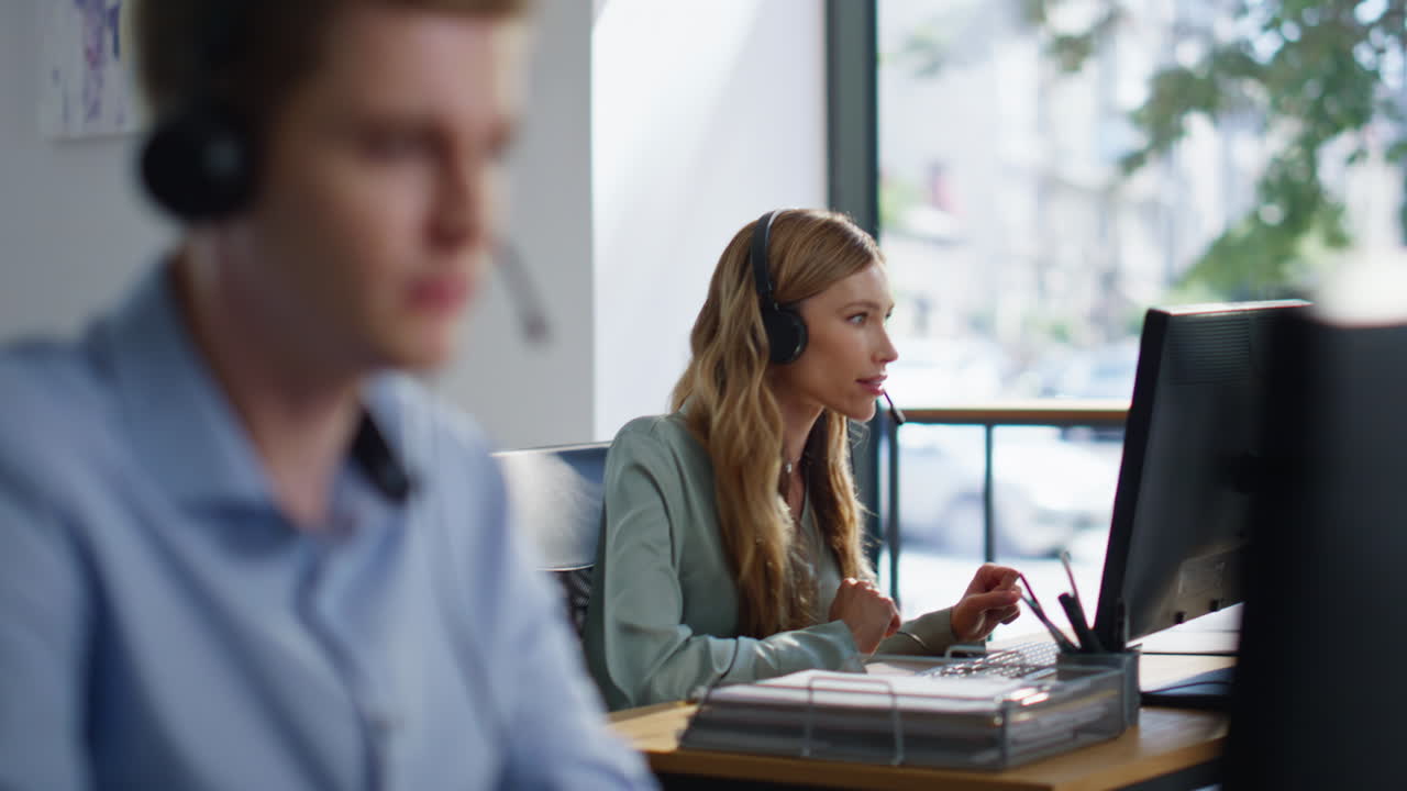 Operator hands typing keyboard processing client request at office closeup