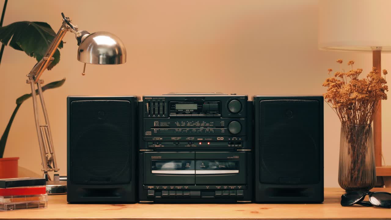 Retro radio tape recorder, audio cassette close-up. Listening to music, old radio boom box player, macro of vintage music listening. . High quality 4k footage