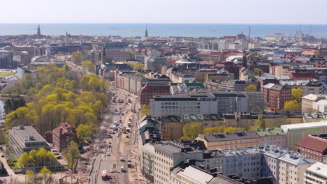 Cityscape-drone-view-over-Töölö-neighborhood-in-Helsinki-with-traffic-down-E12