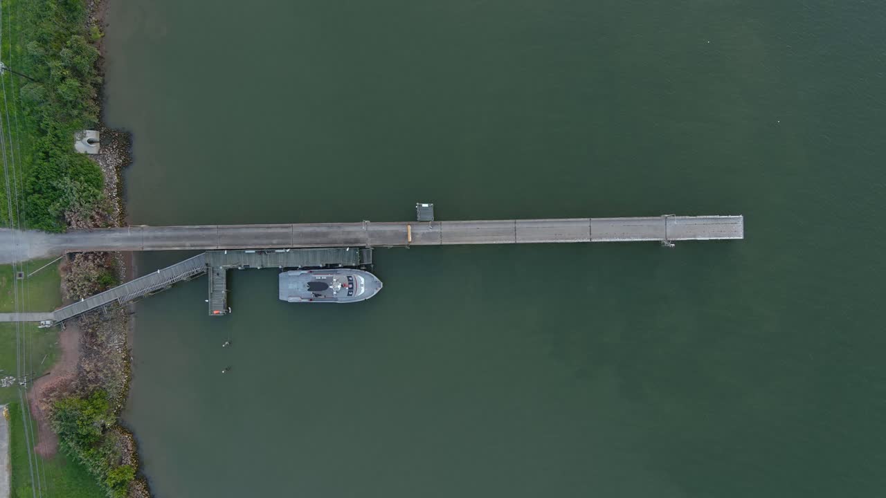 Birdseye view of small boat docked at port
