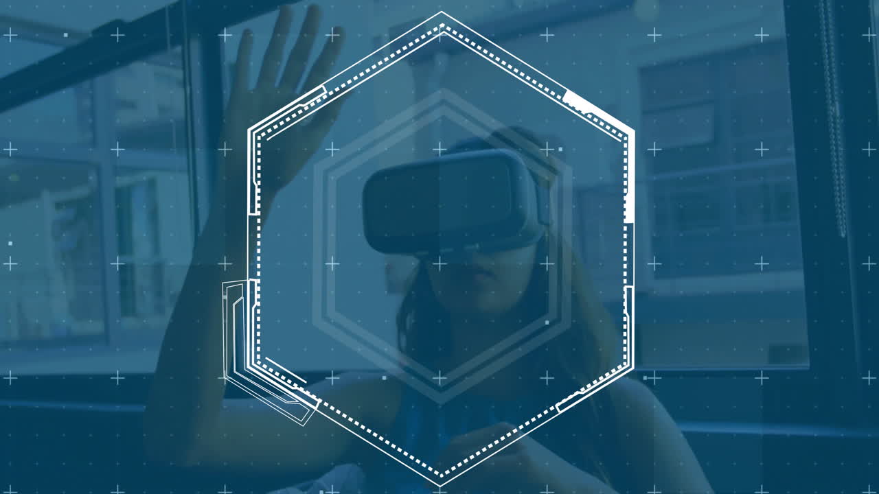 Animation of loading hexagon over caucasian woman gesturing while using vr headset in office