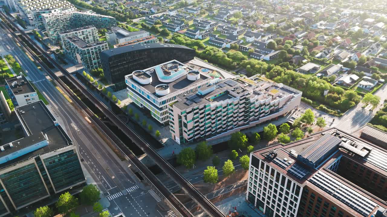 Aerial - futuristic building rooftops near Orestad metro line, Copenhagen