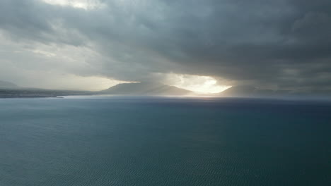 dark clouds in the sky over the seascape in castellammare del golfo, trapani, sicily, italy