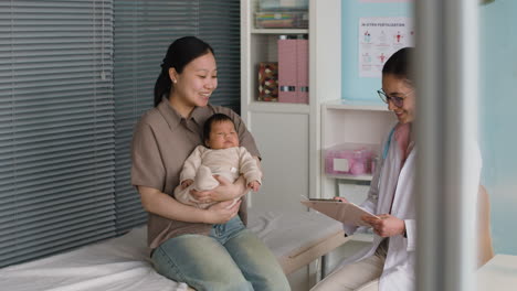mother and baby at pediatrician's office